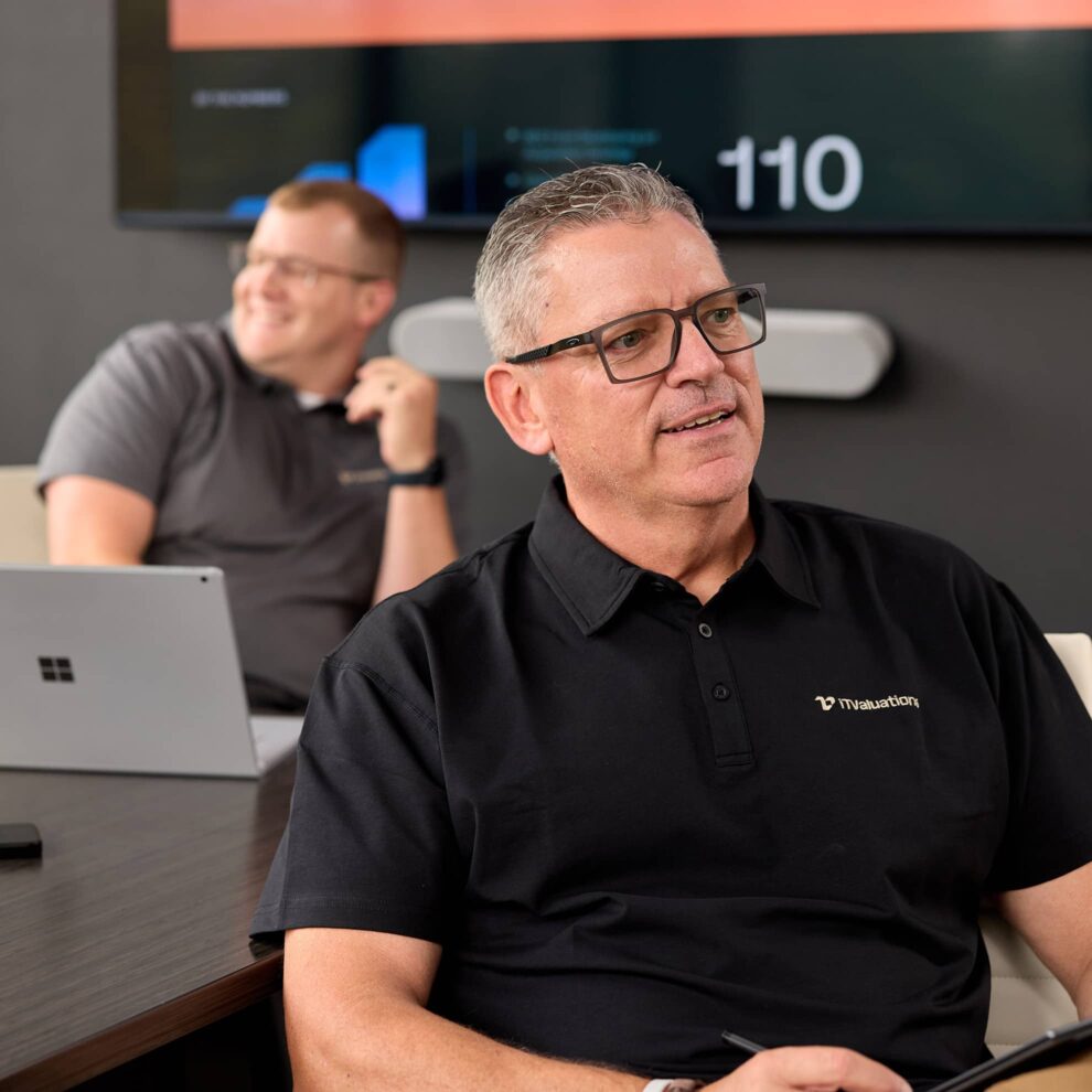 iTValuations Team Members in Conference Room